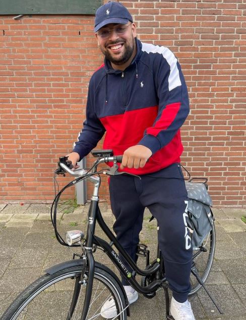 Qucee zijn nieuw gekochte fiets.